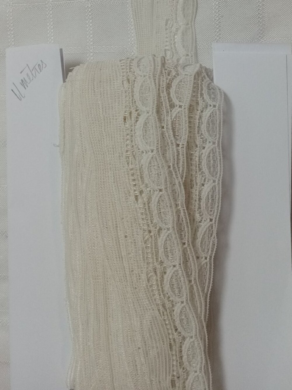 11 meters x 1 inche of brand-new, non-stretch vintage egg-white lace ribbon